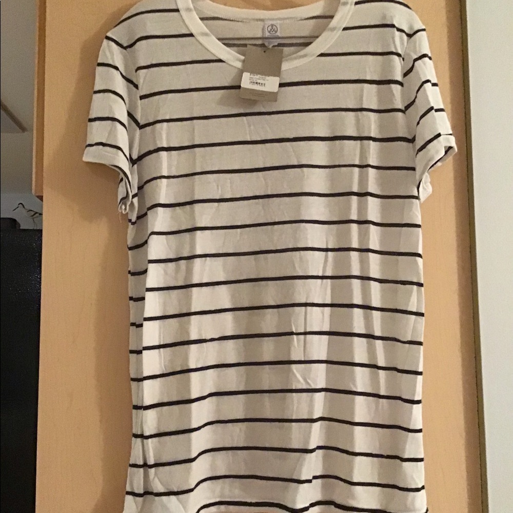 White t-shirt with black stripes.